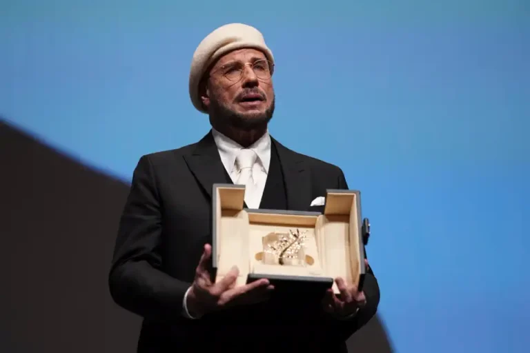 John Travolta receives a surprise honorary Palme d’Or at Cannes
