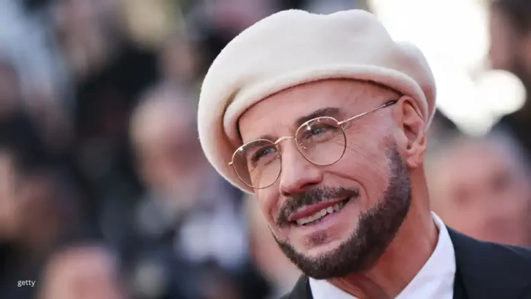 John Travolta explains the viral beret look that had Cannes talking